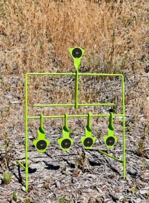 Hands free resetting system made just for softnosed .22 caliber pistol or rifle shooters